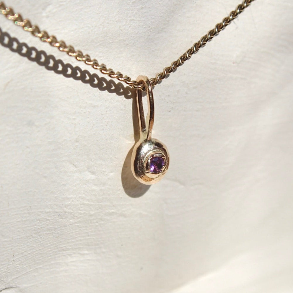 14k light Amethyst beam