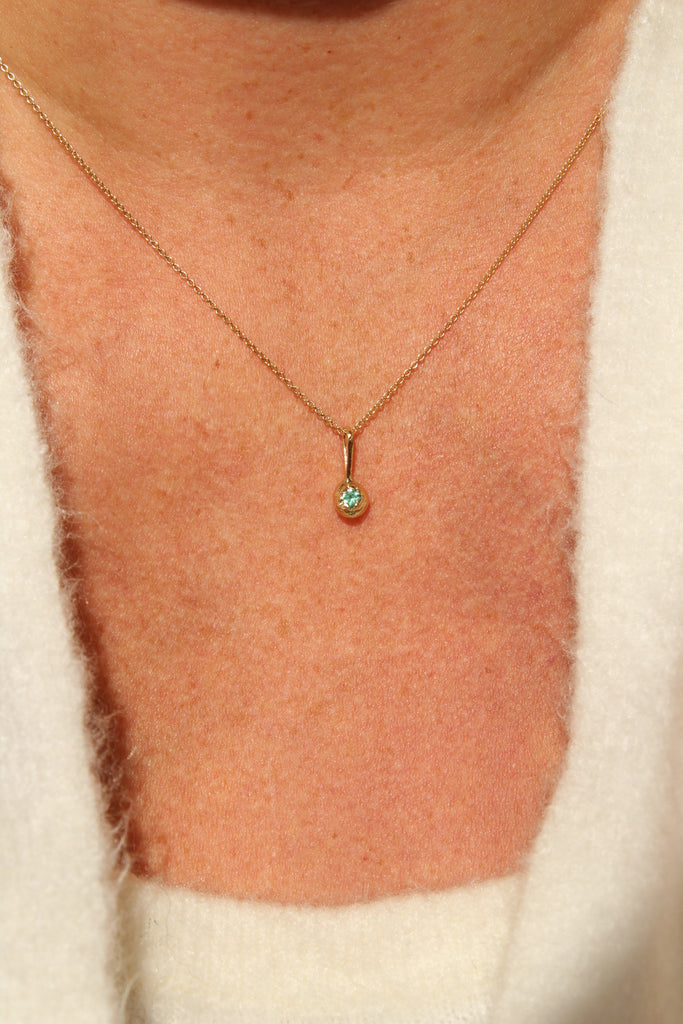 14k Emerald Beam