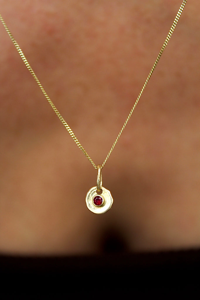 14k Ruby coin