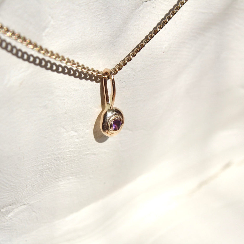 14k light Amethyst beam